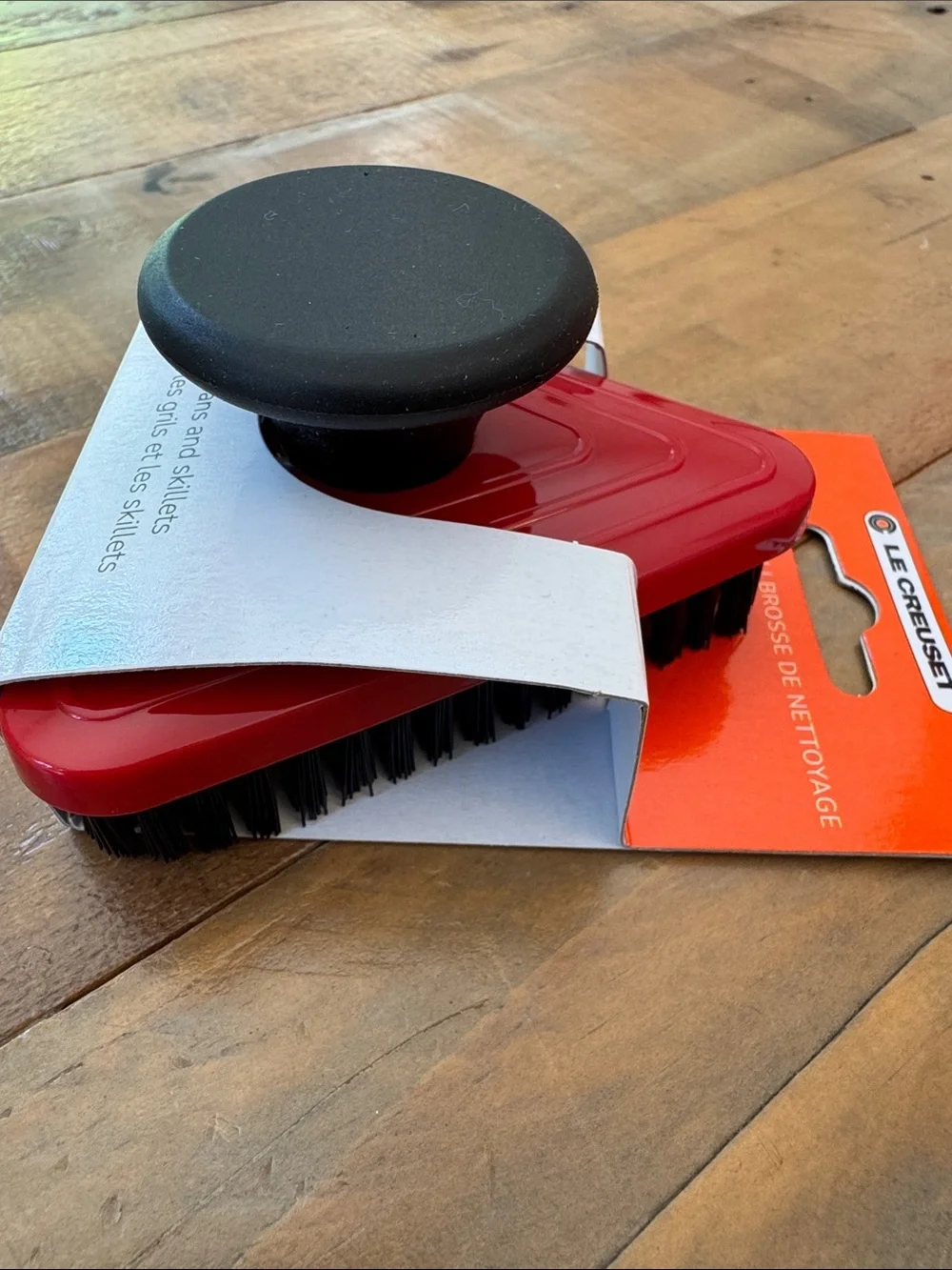 Le Creuset cleaning brush, three cookware protectors, 8 oz cleaner & protector